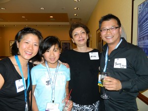 Chair of the Division of Pediatric Dentistry Dr. Mina Mina (second from right) with Dr. Young Tze Kuah '96 (right) and his family at the AAPD Conference on May 28, 2011. In addition to his full-time practice, Kuah is an assistant clinical professor of orthodontics and pediatric dentistry at the University of British Columbia.(Elizabeth Whitty/UConn Photo)