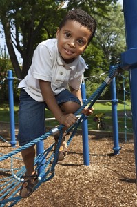 Child on Playground (Shutterstock Photo)