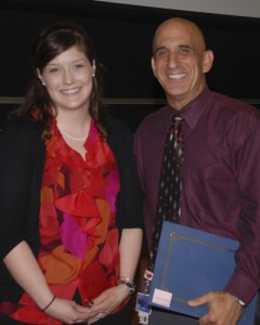 Second-year dental student Melissa Papio presented Dr. Robert Bona the 2011 CAMEL Award at the 2011 Loeser Award Ceremony in Massey Auditorium. (Janine Gelineau/UConn Health Center Photo)