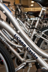A row of UConn bicycles outside the Homer Babbidge Library.