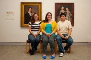 From left, Alysha Elliard ’13 (Fine Arts), Rosemary Cann ’13 (Fine Arts), and Kevin Solorzano ’12 (Art History) at The William Benton Museum of Art. (Sean Flynn/UConn Photo)