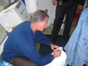 Pharmacist John Dobbins labels a container of controlled substances.