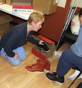 Doreen Smith fits a pair of shoes.