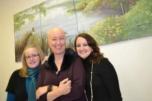 (left to right) William Raveis-American Cancer Society Patient Navigator Pam Nixon, Karen Pergande, and Kerri Goodwin, clinical office assistant for the Neag Comprehensive Cancer Center.