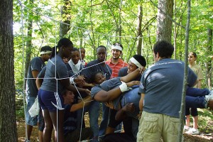 Danielle Ervin, a junior majoring in biology, is lifted through a net by her LSAMP peers at an outdoor leadership training workshop in September. She will travel to Costa Rica over winter break as part of a conservation tour. (LSAMP Photo)