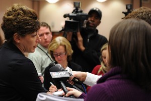 President Susan Herbst, left, speaks with the media about the tuition increase to fund the hiring of 290 new professors, after the Board of Trustees meeting on Dec. 19. (Peter Morenus/UConn Photo)