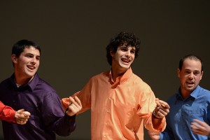 Mike Steinberg '15, left, Jarod Karanian '13, and Dave Steinberg perform in the a cappella group&nbsp; A Completely Different Note at the Student Union Theater. (Ariel Dowski '14 (CLAS)/UConn Photo)