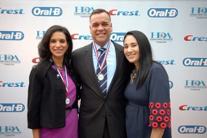 From left, Dr. Sarita Arteaga, UConn Health Center; Dr. Iván Lugo, Procter & Gamble; and Veronica Sanchez, Procter & Gamble, presented the results of the Hispanic Dental Association survey at the HDA annual meeting. (Jer Nelsen)