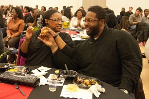 Members of the audience enjoy their meal at the African American Cultural Center's Kwanzaa night. (Max Sinton '15 (CLAS)/UConn Photo)