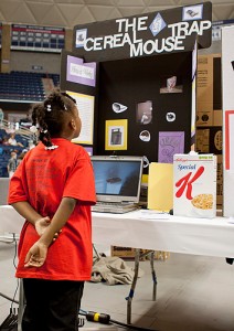 A young exhibitor at last Spring's Connecticut Invention Convention. More than 650 young inventors from grades K-8 participated in the event. (Christopher La Rosa/UConn photo)