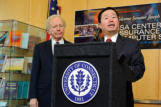 Mun Choi, dean of engineering, introduces U.S. Sen. Joseph Lieberman to an audience of faculty, staff, and students. (Peter Morenus/UConn Photo)