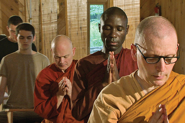 Buddhist monks prarying