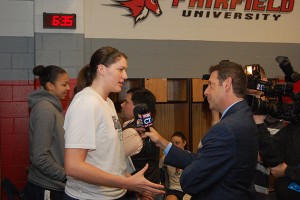 Sophomore center Stefanie Dolson '14 (CLAS) answering questions in the locker room before practice, during Sunday's media session. (Ken Best/UConn Photo)