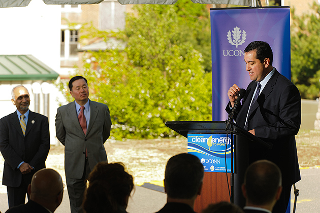 Brian Garcia, CEFIA president, speaks at a ceremony to mark the commissioning of a natural gas fuel cell outside the Center for Clean Energy Engineering on UConn's Depot campus in Storrs on April 26, 2012. At left are Prabhakar Singh, director of the Center for Clean Energy Engineering and Mun Choi, dean of engineering. (Peter Morenus/UConn Photo)