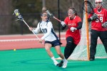 Kiersten Tupper '12 (ED) looks to pass the ball during the Huskies' win over Fairfield earlier this season. (Steve Slade for UConn)