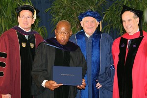 Governor Dannel P. Malloy, US Congressman John Lewis, Chairman of UConn's Board of Trustees Lawrence D. McHugh, and Dean of the Law School Jeremy Paul (Tina Covinsky for UConn)