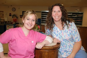 From left: Oncology nurses Christine Kopcha and Marcy Kosak in the UConn Health Center's adult ambulatory care unit. (Janine Gelineau/UConn Health Center Photo)