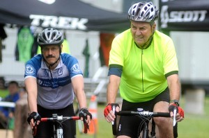 Dr. Peter Schulman, member of the Calhoun Cardiology Center riding team, rides with Jim Calhoun. (Brad Horrigan/Hartford Courant, used with permission)
