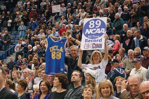 Fans celebrate the women's basketball team's record-breaking performance at the XL Center. The Huskies’ 90-game winning streak from 2008 to 2010 was included in ESPN's 40-year timeline of 'Memorable Moments.' (Kenneth Best/UConn Photo)