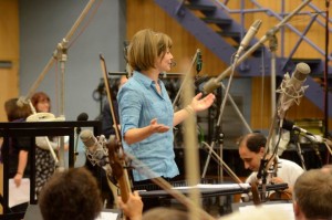 Conductor JoAnn Falletta greets the London Symphony Orchestra as they prepare to record Atlantic Riband. (Photo courtesy of Kenneth Fuchs)