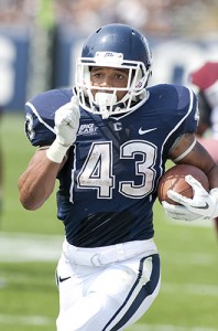 Second-year running back Lyle McCombs '14 (ED) is looking to continue his progress after averaging nearly 96 yards per game. (Steve Slade '89 (SFA) for UConn)