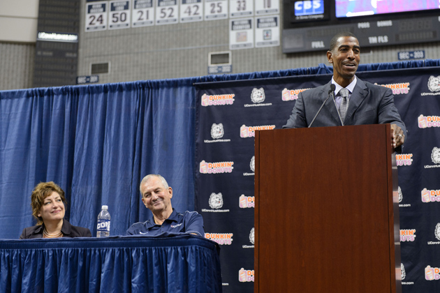 Kevin Ollie, right, speaks at the press conference. (Peter Morenus/UConn Photo)