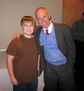 Logan Johnson, left, shown here with Doug Casa), was 12 years old when he suffered exertional heat stroke during junior high school basketball tryouts in Arkansas in August 2010. He survived, but only after days in intensive care and dialysis treatment. (Photo courtesy of Douglas J. Casa/KSI)