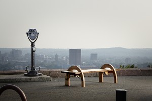 This bench, created by Ted and Zeb Esselstyn, is made from wood from the largest elm tree in the state which came down in Suffield, CT in 2009. The photo was taken in East Rock Park, overlooking New Haven. (Photo by Derek Dudek)