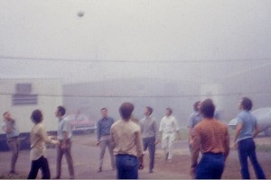 Students taking a break from classes and playing volleyball in the parking lot in front of the metal buildings. (UConn Health Center Archive)