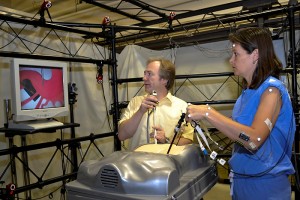 Don Peterson and Dr. Angela Kueck, medical director of the Health Center's robotic surgery program, performing an experiment in the Biodynamics Laboratory. 