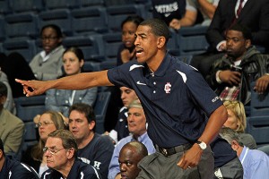Men's head basketball coach Kevin Ollie '95 (CLAS) on the sidelines. (Bob Stowell '70 (CLAS) for UConn)