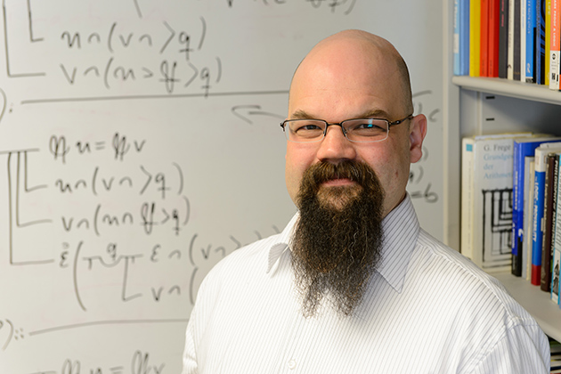 Marcus Rossberg, assistant professor of philosophy, is co-editor of a new translation of Frege's Basic Laws of Arithmetic, to be published this summer by Oxford University Press. (Peter Morenus/UConn Photo)