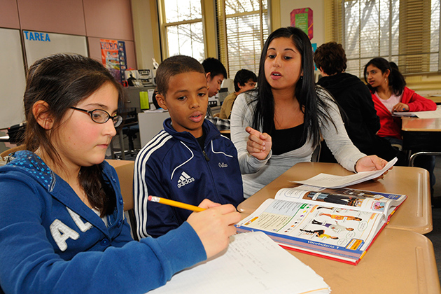 UConn student Denise Ferrier leads a Spanish class at Sedgwick Middle School in West Hartford during her student teaching practicum. The Neag School's teacher preparation programs are ranked #18 in the nation. (Peter Morenus / UConn Photo)