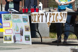 Drawing 'dirty pictures' with watered down mud was a popular activity. (Sean Flynn/UConn Photo)