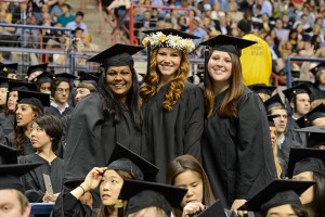 Angel Stevenson of Norwalk, left, Nicole Frisk of Glastonbury, and Amanda Barney of Wallingford at the start of the College of Liberal Arts and Sciences commencement ceremony at Harry A. Gampel Pavilion on May 12, 2013. (Peter Morenus/UConn Photo)