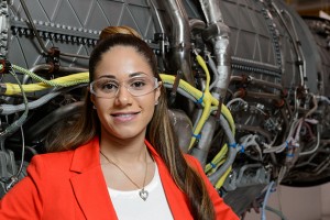 Melissa Jacques ’10 (ENG), project engineer at Pratt & Whitney, is getting some of the world’s most powerful military jets up to speed. See sidebar below for her story. (Peter Morenus/UConn Photo)