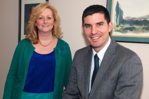 Wendy Martionson, R.N., MSN, with Dr. Jason Ryan (right), who nominated her for a 2013 Connecticut Health Association Healthcare Hero award. (Janine Gelineau/UConn Health Center Photo)