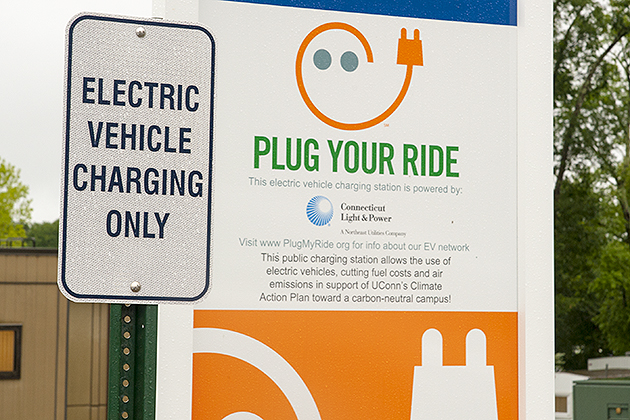 Hybrid charging station at motor pool on Aug. 9, 2013. (Sean Flynn/UConn Photo)