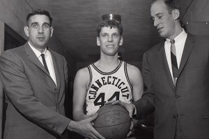 Wes Bialosuknia '67 (CLAS), center, with head coach Fred Shabel, left, and Toby Kimball, a star forward/center for UConn who played with Bialosuknia. (Photo courtesy of Archives & Special Collections, University of Connecticut Libraries)