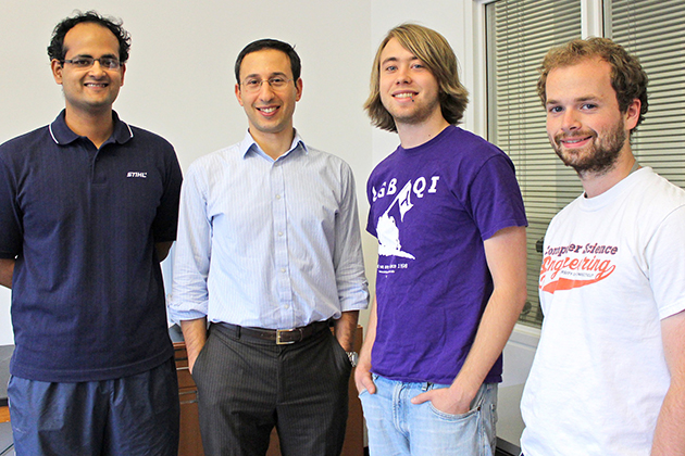 Professor Daniel Schwartz, second from left, with student programmers, from left, Saad Quader, a Ph.D. student in computer science, and undergraduates Joey O'Shea '14 (ENG) and Kevin Ryan '14 (ENG).