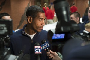 UConn men's head basketball coach Kevin Ollie '95 (CLAS) speaks with members of the media before the First Night show at Gampel Pavilion in October 2012. (Peter Morenus/UConn Photo)