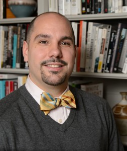 Matthew Hughey, associate professor of sociology at this office at Manchester Hall. (Peter Morenus/UConn Photo)