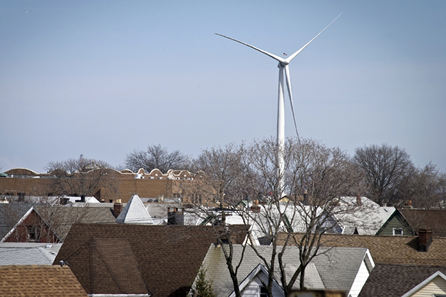 A wind turbine in a densely populated area. (iStock Photo)