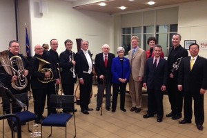 Atlantic Quintet members, from left, John Manning, Seth Orgel, Tim Albright, Andrew Sorg, conductor Jeffrey Renshaw, philanthropists Raymond and Beverly Sackler, composer Kevin Walczyk, his wife Elizabeth, department head Eric Rice, Atlantic Quintet member and UConn music professor Louis Hanzlik, and Provost Mun Choi at the Stamford Campus. (UConn Photo)