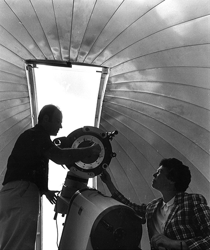 Peterson pictured in the East Road Observatory, with machinist Richard Mindek, who built the facility in the late 1970s. (Photo courtesy of Cynthia Peterson)
