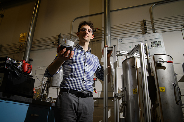 Ari Fischer '15 (ENG), a Udall Scholarship winner, in the lab at the UConn Center for Clean Energy Engineering. Fischer is one of three UConn students who have won prestigious national scholarships recently. (Peter Morenus/UConn Photo)