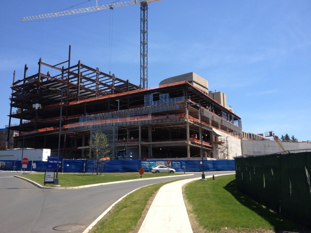 The new hospital tower under construction at the top of the hill is scheduled for completion in early 2016. (Chris DeFrancesco/UConn Health Photo)