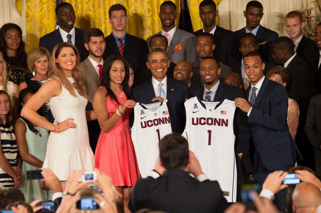 Stefanie Dolson '14 (CLAS) and Bria Hartley '14 (CLAS) for the women's team and Ryan Boatright '15 (CLAS) and Shabazz Napier '14 (CLAS) for the men's team. (Stephen Slade '89 (SFA) for UConn)