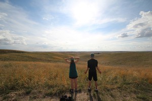 Jennifer Kruzansky and Joe Barrett looking out at the grasslands used by Rocking Arrow Ranch to graze their cattle in the sandhills of Nebraska.. (Photo courtesy of Tom Morris)