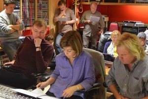 (L to R) Professor Kenneth Fuchs, conductor JoAnn Falletta, and producer Tim Handley, along with engineer Jonathan Allen, members of the London Symphony Orchestra, and Roderick Williams listen to a playback of 'Songs of Innocence and of Experience' in the control room of Abbey Road Studio 2. (Chris von Rosenvinge photo)